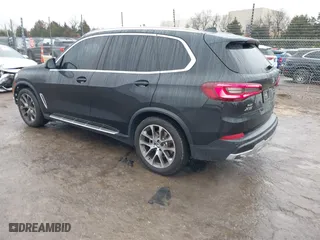 2023 BMW X5 xDrive40i with VIN 5UXCR6C03P9P62891, listed as a IAAI auction lot 41492392 with 51,471 mi miles. Bid and sale history available at carsss.com. Image 3.
