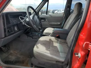 1996 Jeep Cherokee Sport with VIN 1J4FJ68S6TL213886, listed as a Copart auction lot 51462275 with 215,091 mi miles and Salvage title. Bid and sale history available at DreamBid. Image 7.
