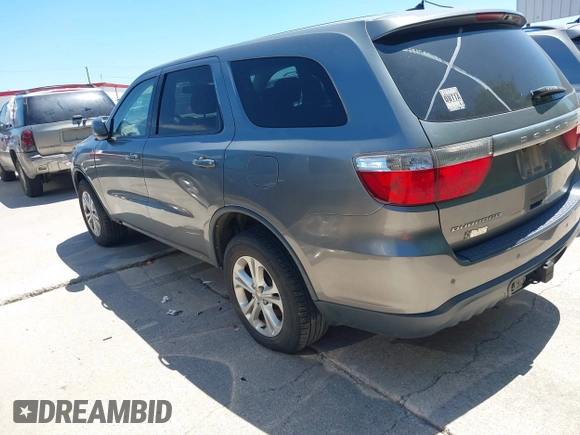 2013 Dodge Durango SXT z VIN 1C4RDHAG4DC512046, wystawiony jako IAAI lot #42826019 z przebiegiem 192 308 mil mil oraz . Historia ofert i sprzedaży dostępna na DreamBid. Obrazek 3.