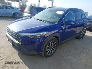2022 Toyota Corolla Cross XLE with VIN 7MUDAAAG7NV024323, listed as a IAAI auction lot 42643048 with 76,465 mi miles and . Bid and sale history available at DreamBid. Image 18.