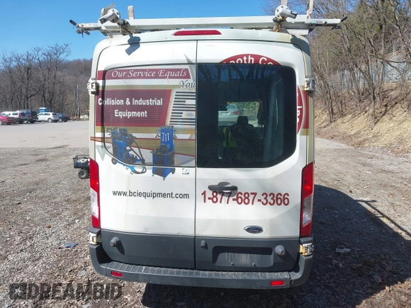 2016 Ford Transit Cargo z VIN 1FTYR2CG4GKA82911, wystawiony jako IAAI lot #41909433 z przebiegiem Nie podano mil oraz . Historia ofert i sprzedaży dostępna na DreamBid. Obrazek 17.