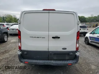 2017 Ford Transit z VIN 1FTYR2YM2HKB51983, wystawiony jako Copart lot #56053945 z przebiegiem 143 786 mil mil oraz Szkoda całkowita • Salvage title. Historia ofert i sprzedaży dostępna na DreamBid. Obrazek 6.