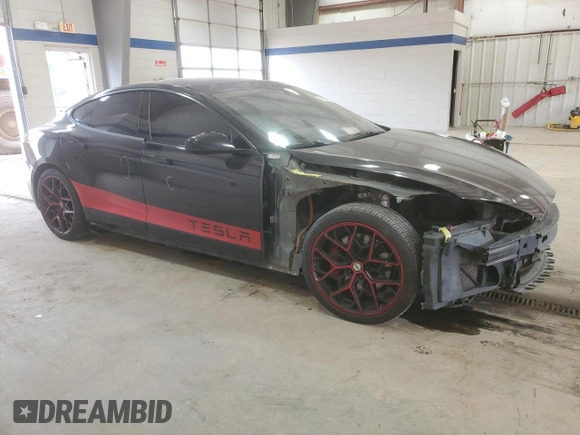 2015 Tesla Model S 85D with VIN 5YJSA1E45FF110480, listed as a Copart auction lot 49107655 with 186,150 mi miles and Salvage Title. Bid and sale history available at carsss.com. Image 4.