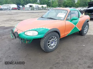 1999 Mazda MX-5 Miata with VIN JM1NB3531X0116676, listed as a IAAI auction lot 42454285 with 201,534 mi miles and . Bid and sale history available at DreamBid. Image 2.