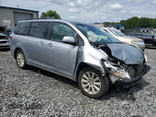 2015 Toyota Sienna LE with VIN 5TDJK3DC8FS104777, listed as a Copart auction lot 63440925 with 195,962 mi miles and Salvage title. Bid and sale history available at DreamBid. Image 4.