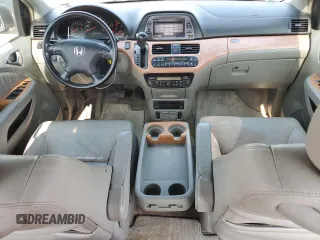 2006 Honda Odyssey EX-L z VIN 5FNRL38756B087695, wystawiony jako Copart lot #60122525 z przebiegiem 213 221 mil mil oraz Szkoda całkowita • Salvage title. Historia ofert i sprzedaży dostępna na DreamBid. Obrazek 8.