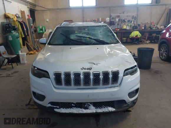 2020 Jeep Cherokee Altitude with VIN 1C4PJMLN6LD647106, listed as a IAAI auction lot 41406440 with 58,788 mi miles. Bid and sale history available at carsss.com. Image 13.
