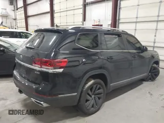 2021 Volkswagen Atlas SEL with VIN 1V2BR2CA7MC513764, listed as a IAAI auction lot 41166277 with 67,850 mi miles and . Bid and sale history available at DreamBid. Image 4.