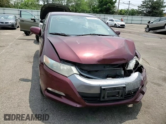 2011 Honda Insight with VIN JHMZE2H31BS008097, listed as a Copart auction lot 60780625 with 111,688 mi miles and Salvage title. Bid and sale history available at DreamBid. Image 13.