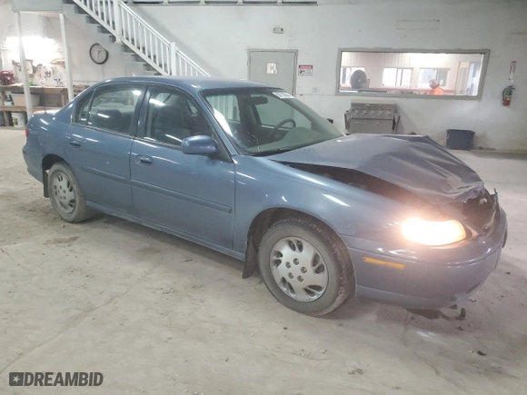 1999 Chevrolet Malibu with VIN 1G1ND52T2X6221114, listed as a Copart auction lot 80739084 with 128,323 mi miles and Salvage Title. Bid and sale history available at carsss.com. Image 4.