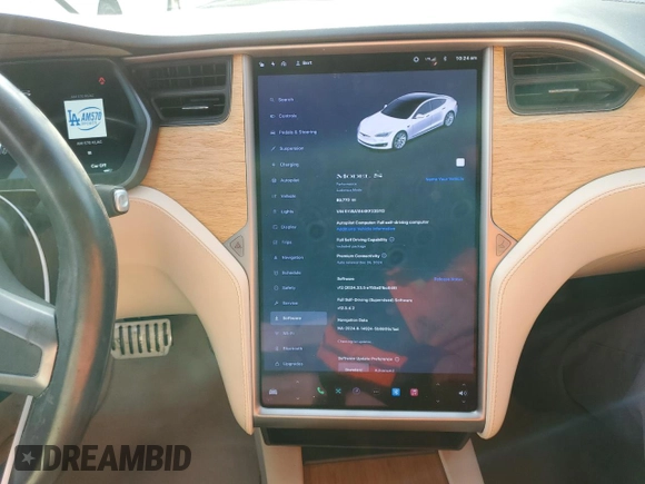 2019 Tesla Model S 100D with VIN 5YJSA1E44KF335113, listed as a Copart auction lot 82936844 with 89,770 mi miles and Salvage title. Bid and sale history available at DreamBid. Image 9.