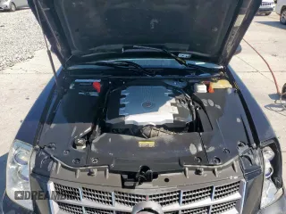 2009 Cadillac STS RWD z VIN 1G6DW67V390103790, wystawiony jako Copart lot #56596915 z przebiegiem 57 537 mil mil oraz Czysty tytuł • Clean title. Historia ofert i sprzedaży dostępna na DreamBid. Obrazek 11.