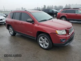 2011 Jeep Compass Limited with VIN 1J4NF5FB7BD164166, listed as a Copart auction lot 42516155 with 129,584 mi miles and Salvage Title. Bid and sale history available at carsss.com. Image 4.