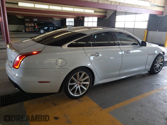 2016 Jaguar XJ R-Sport with VIN SAJWJ1CD1G8V92615, listed as a Copart auction lot 79531373 with 108,166 mi miles and . Bid and sale history available at DreamBid. Image 3.