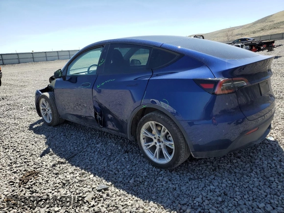 2023 Tesla Model Y Long Range with VIN 7SAYGDEE3PA106609, listed as a Copart auction lot 53839315 with 24,077 mi miles and Salvage Title. Bid and sale history available at DreamBid. Image 2.