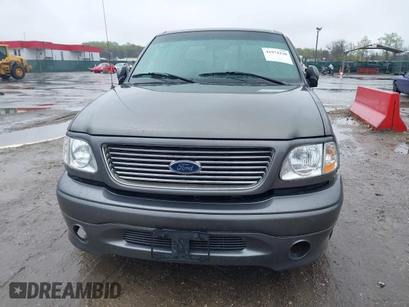 2002 Ford F-150 Harley Davidson with VIN 1FTRW07392KD29874, listed as a IAAI auction lot 41974230 with 163,279 mi miles. Bid and sale history available at carsss.com. Image 6.