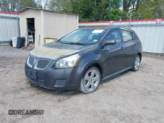 2009 Pontiac Vibe 1SB with VIN 5Y2SP67089Z454034, listed as a IAAI auction lot 41872691 with 233,392 mi miles and . Bid and sale history available at carsss.com. Image 2.