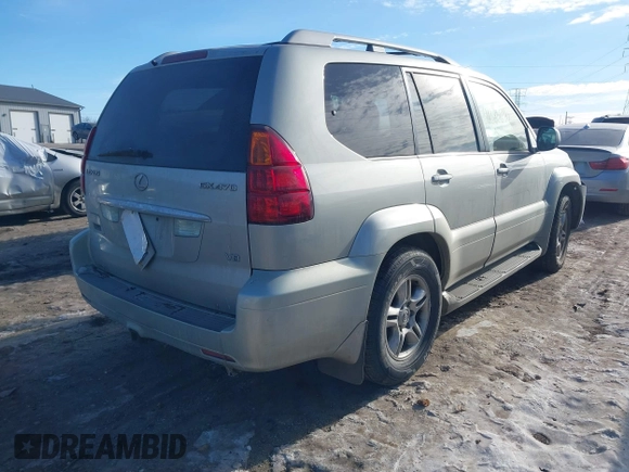 2003 Lexus GX 470 with VIN JTJBT20XX30015034, listed as a IAAI auction lot 41386690 with 234,983 mi miles. Bid and sale history available at carsss.com. Image 4.