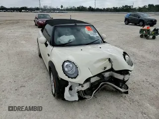 2017 MINI Convertible Cooper z VIN WMWWG5C32H3C20341, wystawiony jako Copart lot #57039685 z przebiegiem 100 575 mil mil oraz Szkoda całkowita • Salvage title. Historia ofert i sprzedaży dostępna na DreamBid. Obrazek 14.