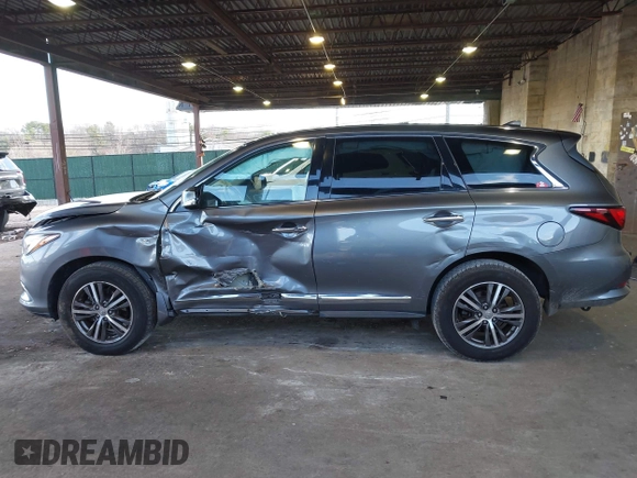 2019 Infiniti QX60 Luxe with VIN 5N1DL0MM8KC558679, listed as a IAAI auction lot 41973649 with 51,867 mi miles and . Bid and sale history available at DreamBid. Image 15.