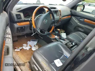 2006 Lexus GX 470 z VIN JTJBT20X660101641, wystawiony jako Copart lot #57242995 z przebiegiem 219 032 mil mil oraz Szkoda całkowita • Salvage title. Historia ofert i sprzedaży dostępna na DreamBid. Obrazek 8.