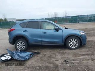 2016 Mazda CX-5 Touring with VIN JM3KE4CY8G0858045, listed as a IAAI auction lot 41941537 with 103,532 mi miles. Bid and sale history available at carsss.com. Image 13.