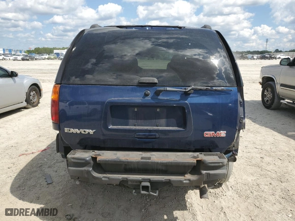 2004 GMC Envoy SLE with VIN 1GKDS13S342428948, listed as a Copart auction lot 52488385 with 292,426 mi miles and Salvage Title. Bid and sale history available at carsss.com. Image 6.