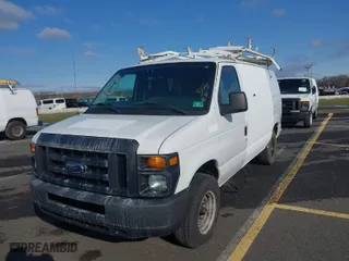 2014 Ford Econoline Cargo Van Commercial with VIN 1FTNE2EL7EDB13904, listed as a IAAI auction lot 41878872 with 145,251 mi miles. Bid and sale history available at carsss.com. Image 2.