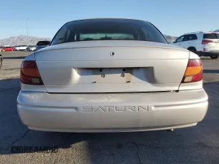 2000 Saturn SL with VIN 1G8ZH5281YZ242734, listed as a Copart auction lot 57433915 with Not provided miles and Salvage title. Bid and sale history available at DreamBid. Image 6.