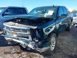 2015 Chevrolet Silverado 1500 LT with VIN 1GCRCREHXFZ267054, listed as a IAAI auction lot 41543297 with 134,087 mi miles. Bid and sale history available at carsss.com. Image 2.