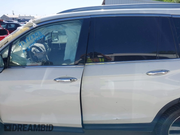 2016 Honda Pilot Touring with VIN 5FNYF6H97GB088824, listed as a IAAI auction lot 41991803 with 84,761 mi miles. Bid and sale history available at carsss.com. Image 15.