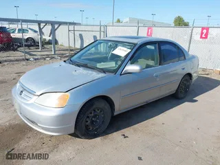 2001 Honda Civic EX with VIN 2HGES26771H512949, listed as a IAAI auction lot 42020043 with 299,833 mi miles. Bid and sale history available at carsss.com. Image 2.
