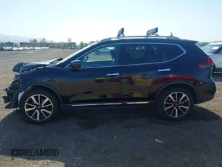 2019 Nissan Rogue SL with VIN 5N1AT2MT1KC833220, listed as a IAAI auction lot 42179936 with 82,232 mi miles and . Bid and sale history available at DreamBid. Image 15.