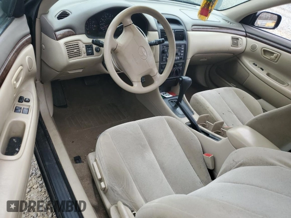 1999 Toyota Solara SE with VIN 2T1CG22PXXC169800, listed as a Copart auction lot 48295215 with 203,587 mi miles and Salvage Title. Bid and sale history available at DreamBid. Image 8.