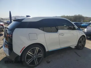 2014 BMW i3 with VIN WBY1Z4C51EV276642, listed as a Copart auction lot 52571115 with 112,178 mi miles and Salvage title. Bid and sale history available at DreamBid. Image 3.