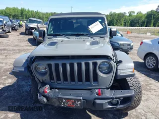 2018 Jeep Wrangler Unlimited Rubicon with VIN 1C4HJXFG6JW267087, listed as a IAAI auction lot 42235058 with 93,962 mi miles and . Bid and sale history available at DreamBid. Image 11.