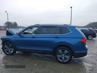 2020 Volkswagen Tiguan SE z VIN 3VV3B7AX5LM176136, wystawiony jako IAAI lot #41564431 z przebiegiem 74 867 mil mil oraz . Historia ofert i sprzedaży dostępna na DreamBid. Obrazek 14.