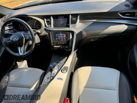 2023 Infiniti QX55 Luxe z VIN 3PCAJ5JR5PF103535, wystawiony jako Copart lot #44084545 z przebiegiem 45 316 mil mil oraz Czysty tytuł • Clean title. Historia ofert i sprzedaży dostępna na DreamBid. Obrazek 9.