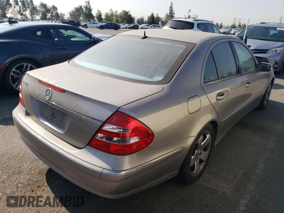 2005 Mercedes-Benz E 5.0L with VIN WDBUF70J75A693702, listed as a Copart auction lot 63497604 with 122,410 mi miles and Clean Title. Bid and sale history available at carsss.com. Image 3.