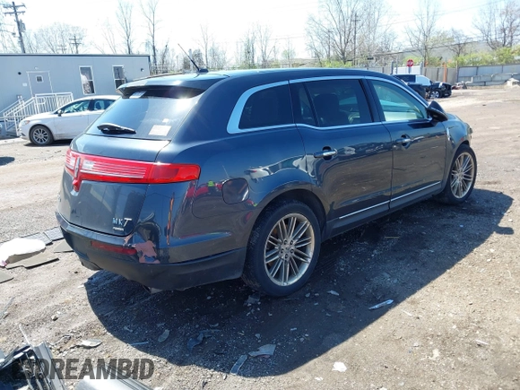 2014 Lincoln MKT EcoBoost z VIN 2LMHJ5ATXEBL57360, wystawiony jako IAAI lot #41976182 z przebiegiem 126 676 mil mil oraz . Historia ofert i sprzedaży dostępna na DreamBid. Obrazek 4.