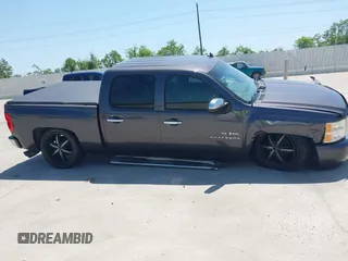 2010 Chevrolet Silverado 1500 LT with VIN 3GCRCSE06AG138545, listed as a IAAI auction lot 41990971 with 243,252 mi miles and . Bid and sale history available at DreamBid. Image 13.