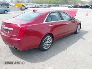 2015 Cadillac CTS Luxury AWD z VIN 1G6AX5SX5F0129130, wystawiony jako IAAI lot #42147471 z przebiegiem 93 678 mil mil oraz . Historia ofert i sprzedaży dostępna na DreamBid. Obrazek 4.