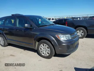 2015 Dodge Journey SE z VIN 3C4PDCAB5FT739266, wystawiony jako IAAI lot #41725086 z przebiegiem 134 109 mil mil oraz . Historia ofert i sprzedaży dostępna na DreamBid. Obrazek 1.