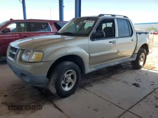 2004 Ford Explorer Sport Trac XLS z VIN 1FMZU67K14UC21140, wystawiony jako Copart lot #57873115 z przebiegiem 131 040 mil mil oraz Czysty tytuł • Clean title. Historia ofert i sprzedaży dostępna na DreamBid. Obrazek 1.