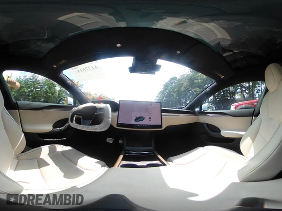 2021 Tesla Model S Plaid z VIN 5YJSA1E62MF452838, wystawiony jako IAAI lot #42726183 z przebiegiem 21 725 mil mil oraz . Historia ofert i sprzedaży dostępna na DreamBid. Obrazek 20.