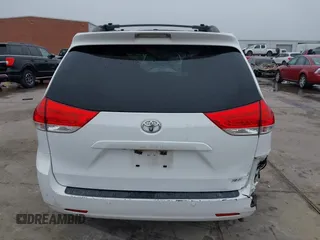 2014 Toyota Sienna XLE z VIN 5TDYK3DC5ES439511, wystawiony jako IAAI lot #41510779 z przebiegiem 218 782 mil mil oraz . Historia ofert i sprzedaży dostępna na DreamBid. Obrazek 17.