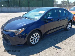 2022 Toyota Corolla LE with VIN 5YFEPMAE8NP320053, listed as a IAAI auction lot 42020183 with 6,673 mi miles and . Bid and sale history available at carsss.com. Image 18.