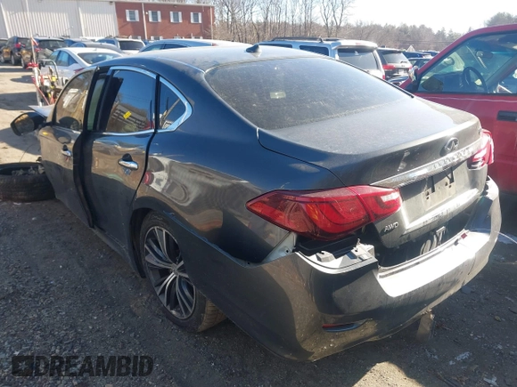 2015 Infiniti Q70 with VIN JN1BY1AR0FM562523, listed as a IAAI auction lot 41310831 with 73,870 mi miles and . Bid and sale history available at DreamBid. Image 3.