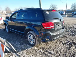 2013 Dodge Journey SXT with VIN 3C4PDCBB3DT564737, listed as a IAAI auction lot 41666723 with 169,486 mi miles. Bid and sale history available at carsss.com. Image 3.