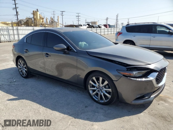 2021 Mazda 3 Premium with VIN JM1BPADL7M1342365, listed as a Copart auction lot 58619075 with 40,556 mi miles and Salvage title. Bid and sale history available at DreamBid. Image 4.